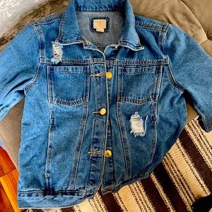 Distressed denim jacket